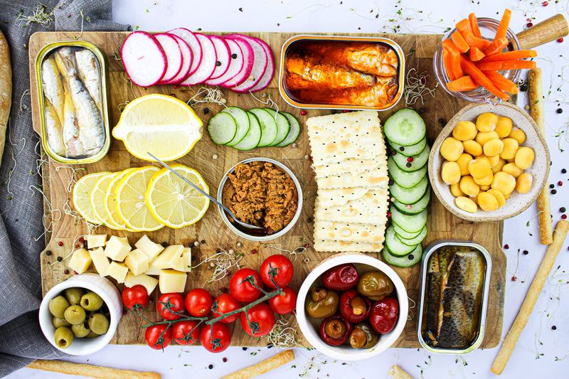 Descubra como a Seacuterie Board está redefinindo as conservas na gastronomia gourmet com a Fui ao Mar!